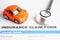 Stethoscope on Insurance claim accident car form, Car loan, insurance and leasing time concepts