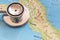 Stethoscope on Italy map background