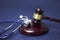 Stethoscope and judgement hammer. Gavel and stethoscope. medical jurisprudence. legal definition of medical malpractice