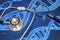 Stethoscope, magnifying glass and genetic diseases research