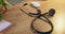 Stethoscope, medical tool and hospital desk at a doctor office and clinic for consultation. Healthcare, professional and