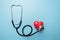 Stethoscope with red heart, healthcare heart check concept, world heart health day