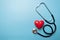 Stethoscope with red heart, healthcare heart check concept, world heart health day, health insurance concept