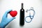 Stethoscope and red wine, doctor recommendations for drinking alcohol