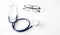 Stethoscope and spectacles on white background. Doctor stethosco