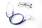 Stethoscope and spectacles on white background. Doctor stethoscope on a white background with space for text. Spectacles glass on