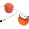 Stethoscope with tangerines and apples on a white background