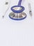 Stethoscope and thermometer with syringe