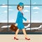 Stewardess with briefcase walking through airport terminal