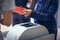 Stewardess checks the ticket and passport