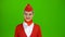 Stewardess looks up and smiles. Green Screen