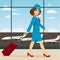 Stewardess with luggage walking through airport terminal