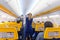 Stewardess serving passangers on Ryanair airplane flight on 14th of December, 2017 on a flight from Trieste to Valencia.