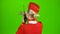 Stewardess speaks on the walkie talkie. Green screen. Back view