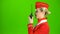 Stewardess speaks on the walkie talkie. Green screen. Side view