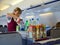 Stewardess at work - spills soft drinks