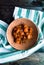 Stewed curry pumpkin in a ceramic bowl