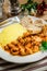 Stewed cuttlefish with polenta and crostini