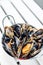 Stewed fresh mussels in spicy garlic wine seafood sauce