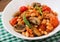 Stewed white beans with mushrooms and tomatoes with spicy sauce