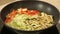 Stewing vegetables in a wok