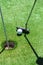 Stick with a ball on an artificial golf