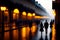 the stick figures on the most major big city street at night in the rain with only walkway colorful reflective light.