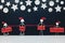 Stick man family figure wearing santa hat with red distance marker and Merry and Safe Christmas greeting banner.