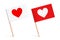 Sticked little paper flags with heart icons.