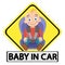 Sticker baby in the car. A small child sitting in a chair to travel in a car.