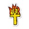 sticker of a cartoon ankh symbol