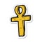 sticker of a cartoon ankh symbol