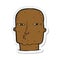 sticker of a cartoon bald tough guy