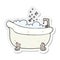 sticker of a cartoon bath full of water