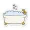 sticker of a cartoon bathtub