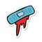 sticker of a cartoon bloody plaster