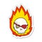 sticker of a cartoon burning skull