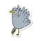 sticker of a cartoon flapping wood pigeon