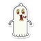 sticker of a cartoon ghost with flaming eyes