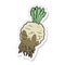 sticker of a cartoon muddy turnip