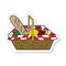 sticker of a cartoon picnic basket