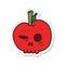 sticker of a cartoon poison apple
