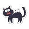 sticker of a cartoon scared black cat