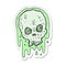 sticker of a cartoon slimy skull