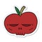 sticker of a cartoon spooky skull apple