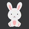 Sticker of cute baby rabbit sitting. Adorable woodland animal character for design of album, scrapbook, card, poster, invitation