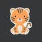 Sticker of cute baby tiger sitting. Adorable jungle animal character for design of album, scrapbook, card, poster, invitation