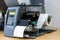 Sticker label printer. Barcode digital printer and applicator machine