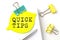 Sticker with QUICK TIPS text on notebooks on the white background
