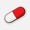 Sticker of red and white pill with contour